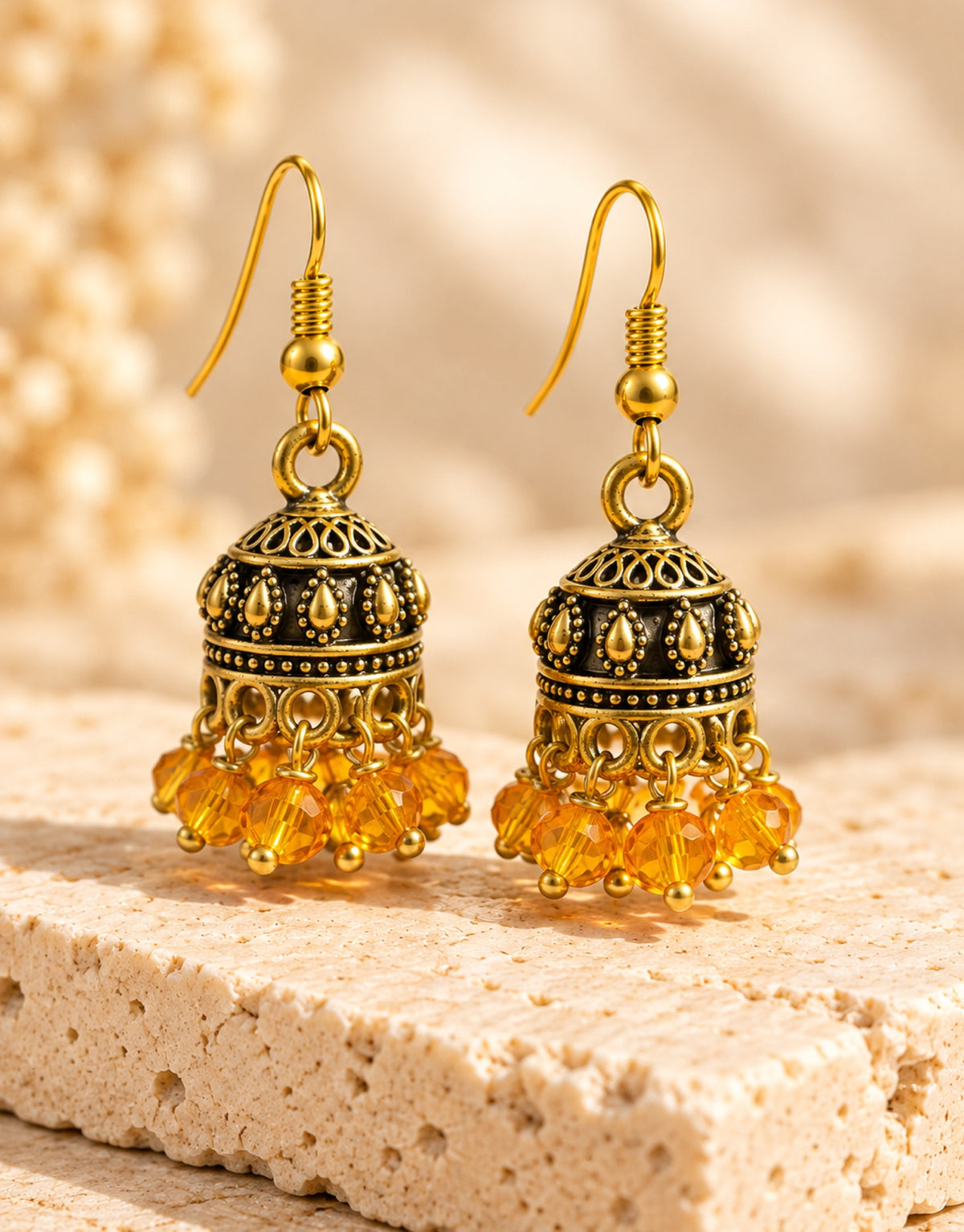 Orneza Antique Gold-Tone Mini Jhumka Earrings with Amber Beads — angle view