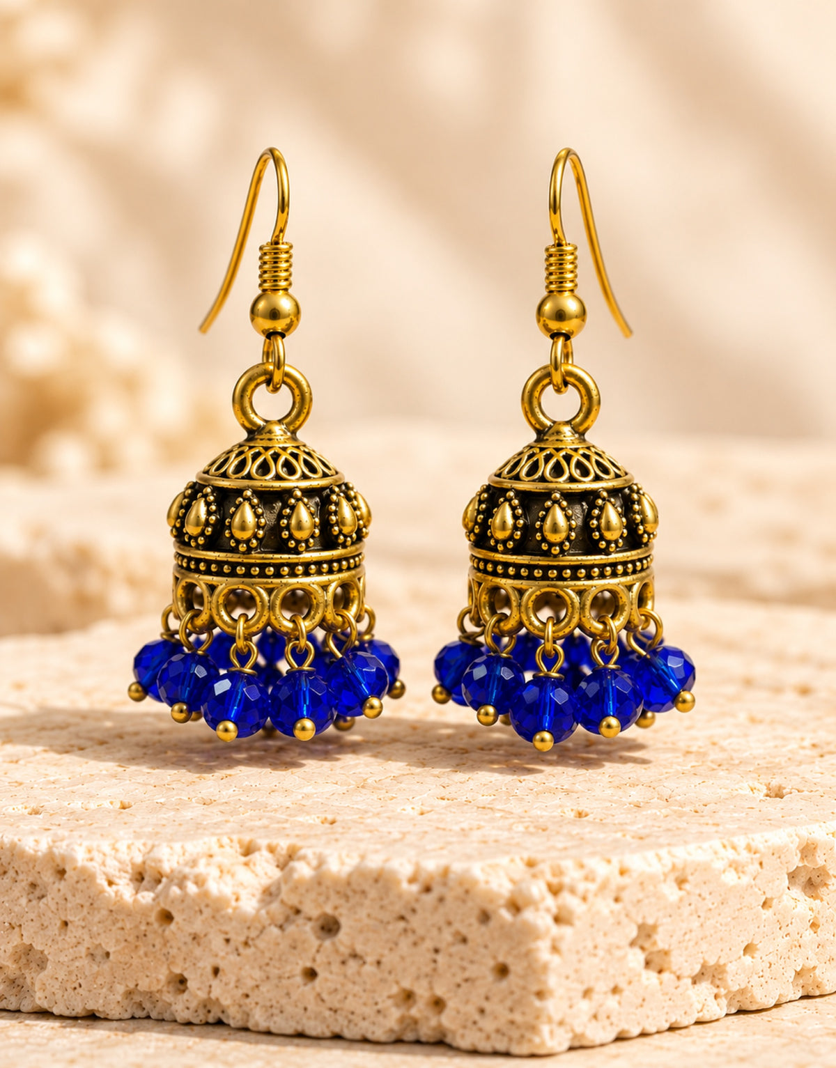 Orneza Antique Gold-Tone Mini Jhumka Earrings with Cobalt Blue Beads — front view