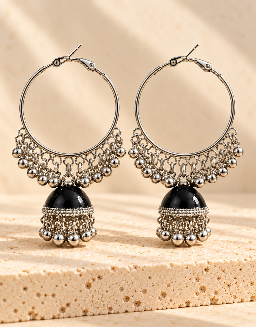 Orneza Silver-Tone Hoop Jhumka Earrings in Black — front view