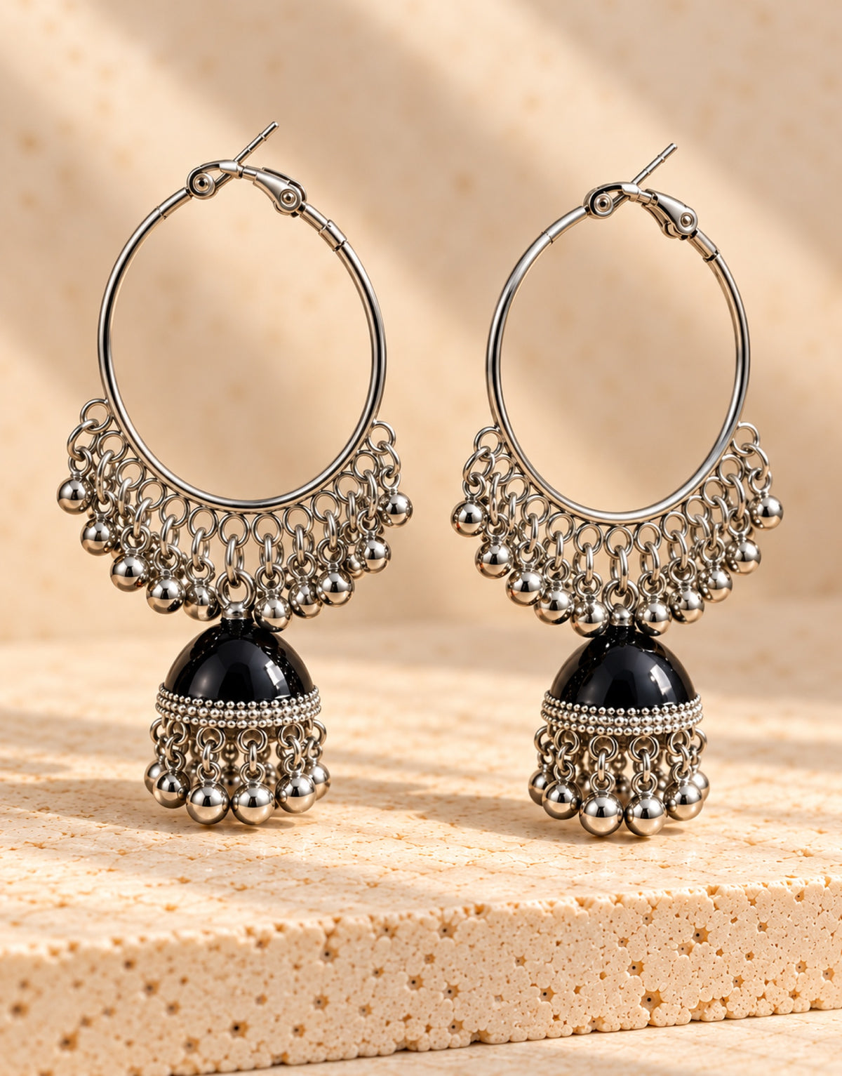 Orneza Silver-Tone Hoop Jhumka Earrings in Black — angle view