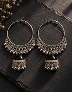Orneza Silver-Tone Hoop Jhumka Earrings in Black — styled view