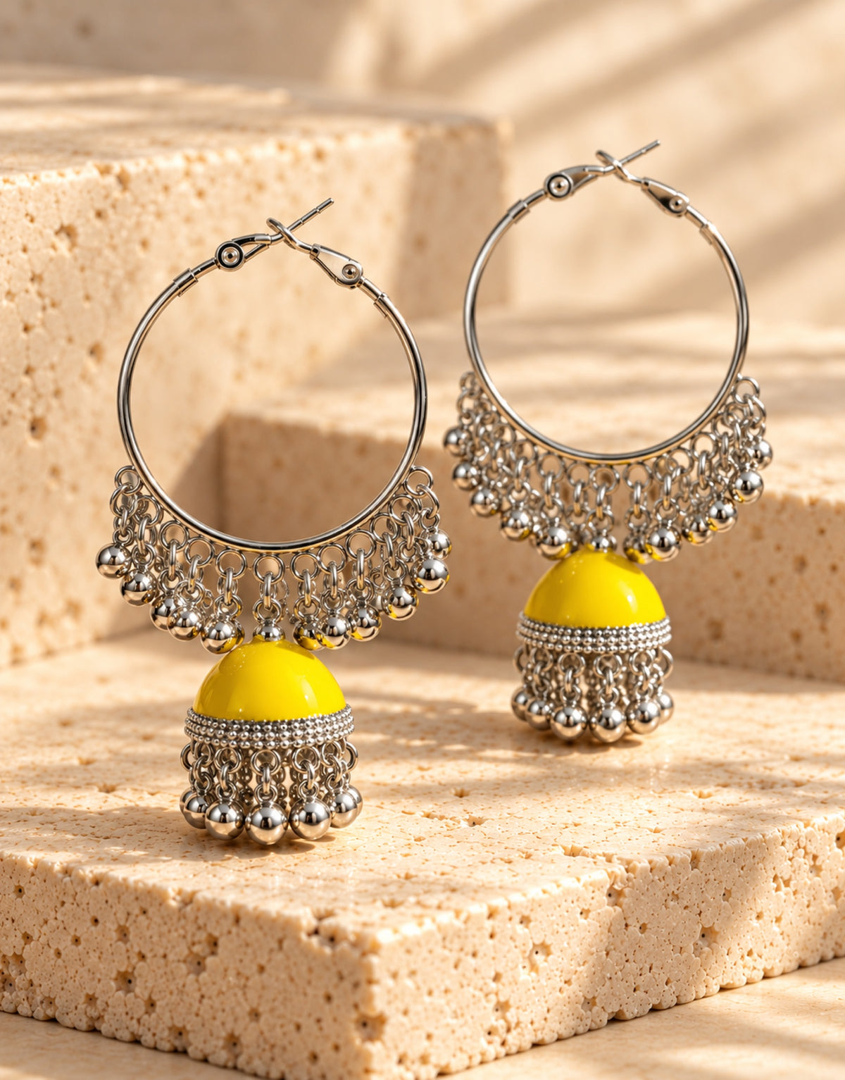 Orneza Silver-Tone Hoop Jhumka Earrings in Yellow — angle view