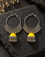 Orneza Silver-Tone Hoop Jhumka Earrings in Yellow — styled view