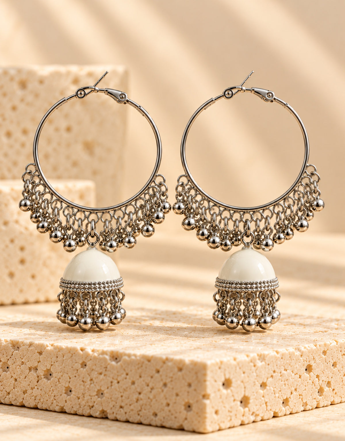 Orneza Silver-Tone Hoop Jhumka Earrings in White — front view
