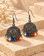 Orneza Oxidised Filigree Jhumka Earrings with Multicolour Beads — angle view
