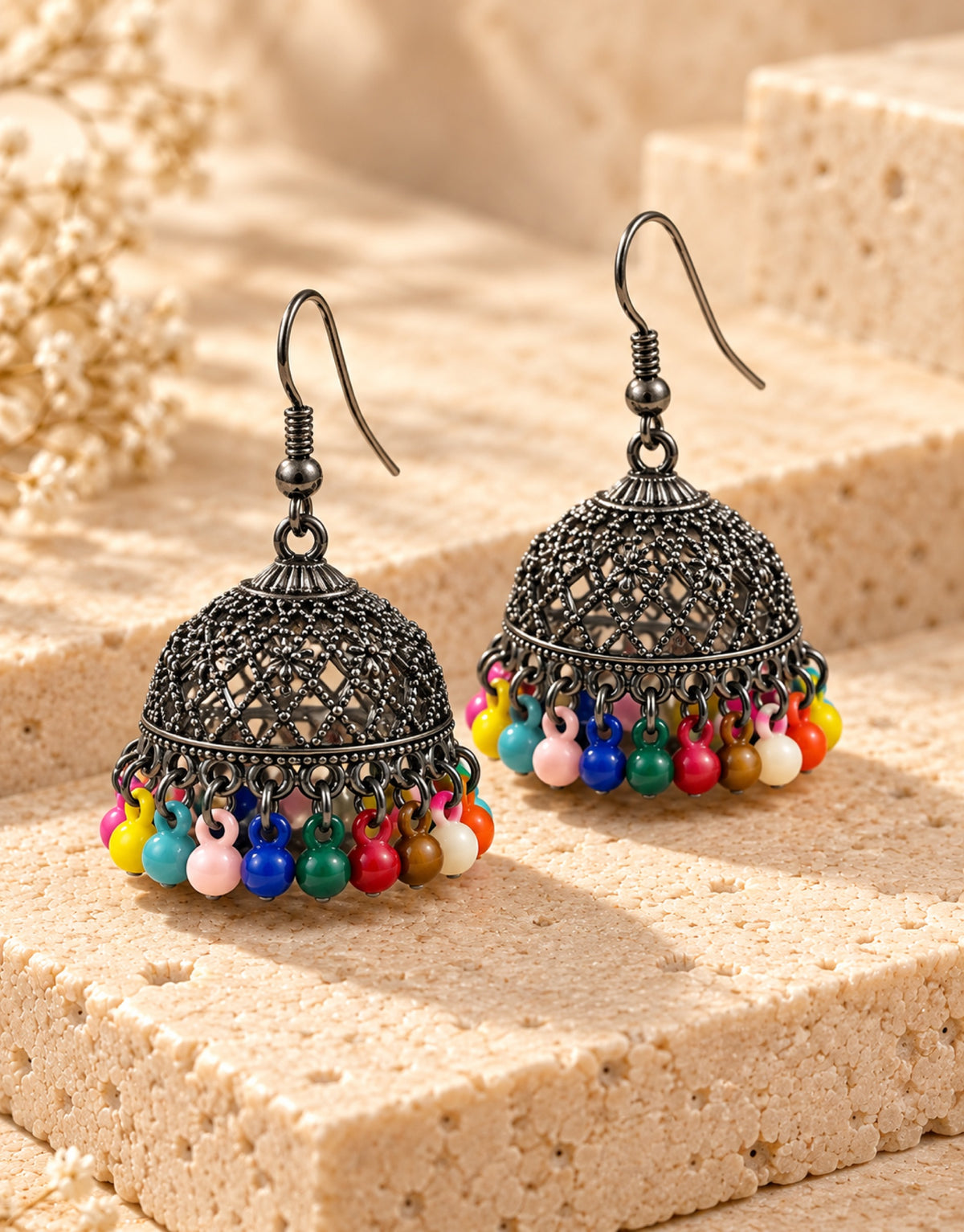 Orneza Oxidised Filigree Jhumka Earrings with Multicolour Beads — angle view