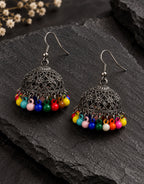 Orneza Oxidised Filigree Jhumka Earrings with Multicolour Beads — styled view