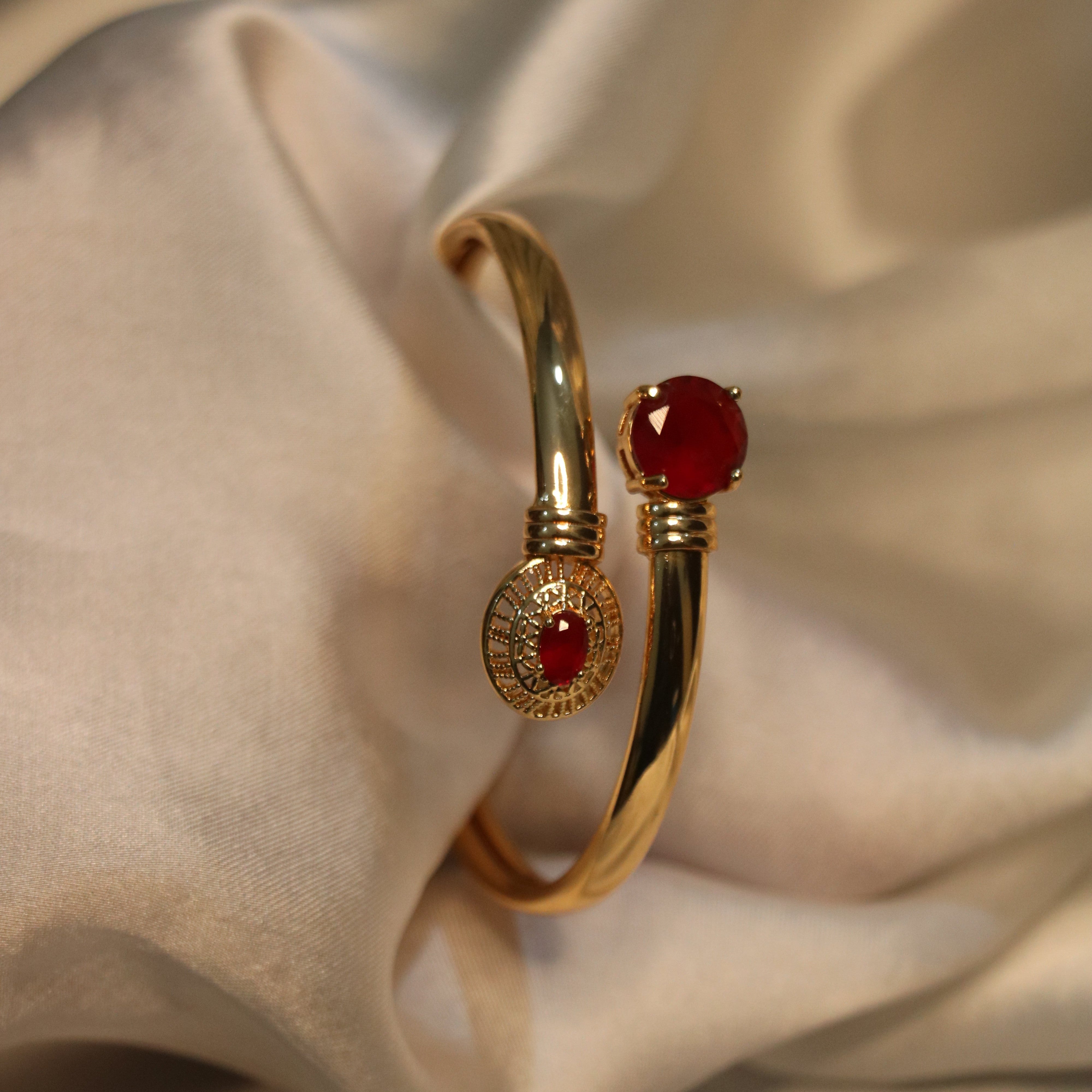 Golden Ruby Charm Bracelet – A Statement of Elegance and Grace